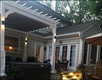 10 x 10 Vinyl Belvedere Pergola Shown on a Patio (ANGLE 3).