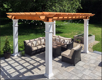 10 x 12 Red Cedar Solace Free Standing Pergola shown with Cedar Tone Stain/Sealer, 16" top runner spacing, and stainless steel hardware. 