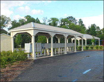 Custom 10 x 40 Vinyl Ramada shown with Elegant Ivory Vinyl, No Deck, 6" Post Trim, 6x6 Posts, 6" Taller Posts, No Cupola, Clay Metal Roof, and Stainless Steel Hardware.