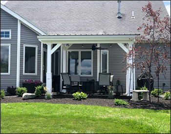 12 x 14 White Vinyl Pergola Pavilion shown with 6x6 Vinyl Sleeves over Posts, 36" Post Trim, Double 2"x8" Headers, Charcoal Metal Roof, 2/12 Pitch Roof, and Vinyl Ceiling.