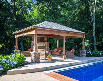  16 x 20 Cedar Ramada shown with No Deck, 16" Post Trim, Dual Gray Asphalt Shingles, Cedar Stain, 6x6 Posts, and Arched Beams.