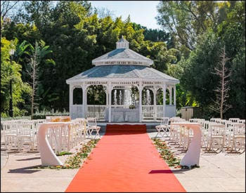 20 Vinyl Double Roof Dodecagon Gazebo shown with Harbor Grey Composite Deck, Old English Pewter Asphalt Shingles, Two Additional Entrances, Four Benches, and Customer Painted Ceiling.