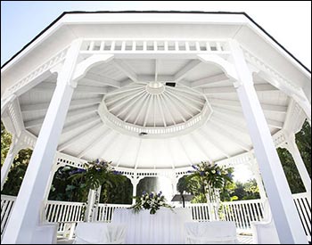 20 Vinyl Double Roof Dodecagon Gazebo shown with Harbor Grey Composite Deck, Old English Pewter Asphalt Shingles, Two Additional Entrances, Four Benches, and Customer Painted Ceiling.