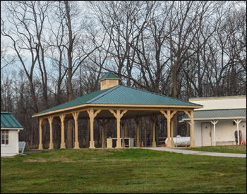 20 x 40 Treated Pine Ramada  shown with 26 Gauge Green Metal Roof, 5:12 roof slope, Custom Structural Braces, Custom Cupola, No Deck, 8x8 Treated Posts, Pine Tongue and Groove Ceiling