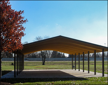 30 x 52 Wood Gable Rectangular Savannah Pavilion shown with Tube Steel Columns, 26 Gauge Metal Roofing, 3:12 Roof Pitch, Factory Stain, and No Cupola. 