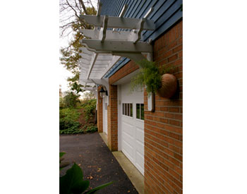 Custom Treated Pine 26 x 3 Wall Mounted Pergola shown with white paint.